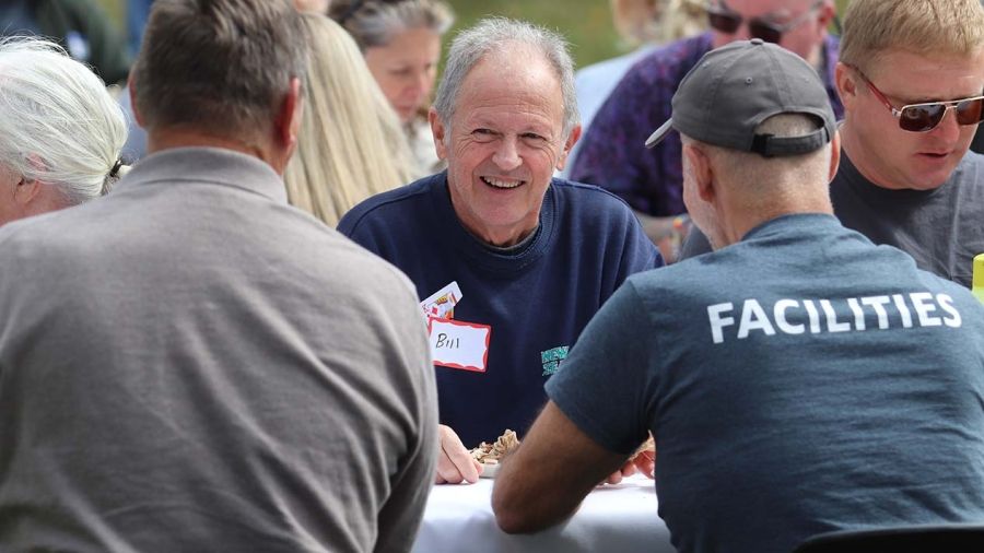 Facilites staff chat at welcome back barbecue