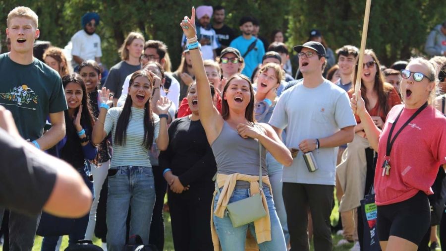 A group of students cheer at Get Connected