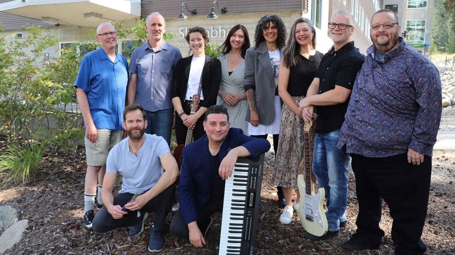 The current Contemporary Music & Technology Program faculty stand in a group